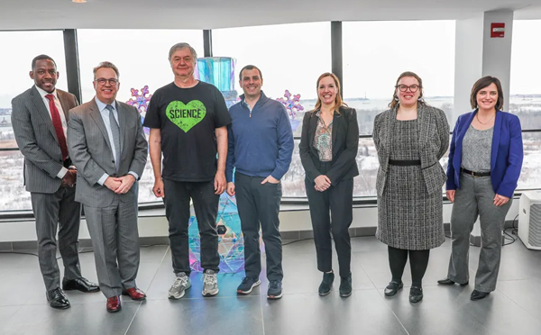 president williams with business leaders and staff