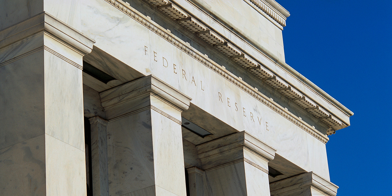 exterior of federal reserve building against blue sky