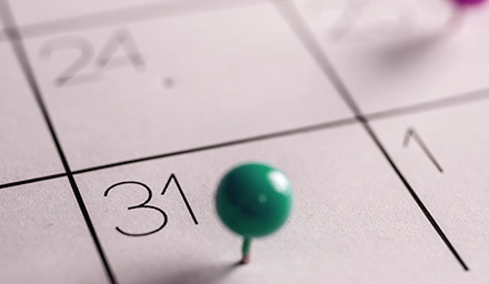Photo: Partial calendar with a green pin on the 31st.