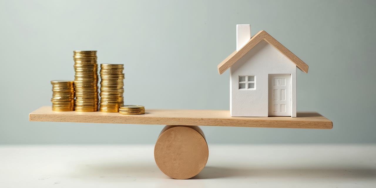 Photo: Conceptual photo shows balance between mortgage rates, house price. Miniature house, stacks of coins on seesaw real estate investment, financial stability, home ownership, loan, value. Economic Photo: Conceptual photo shows balance between mortgage rates, house price. Miniature house, stacks of coins on seesaw real estate investment, financial stability, home ownership, loan, value. Economic